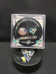 2015 San Jose Sharks vs New York Islanders November 10-2015 With 25 year puck case holder. Used warm up puck.