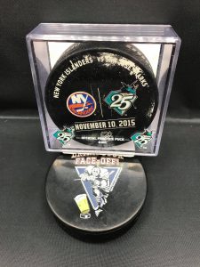 2015 San Jose Sharks vs New York Islanders November 10-2015 With 25 year puck case holder. Used warm up puck.