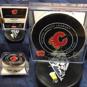 2018 Calgary Flames vs Vancouver Canucks game used 3rd period puck. December December 29 2018. #CF-2631