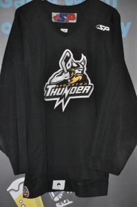 ECHL Stockton Thunder. #4 Player unknown. Black Size 56. SP Brand. Sewn on crest logo  and numbers. Obtained from team sale.