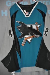 2003-04 San Jose Sharks. #42 Tom Preissing. Koho. Teal Size 54. Obtained from team. Jersey shows excellent game wear.